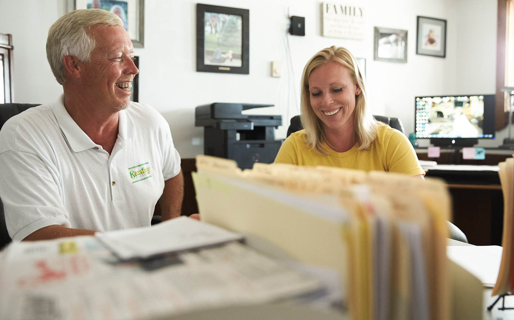 Image of Keesling Farms Growers for Red Gold Tomatoes David and daughter Kaycie in farm office