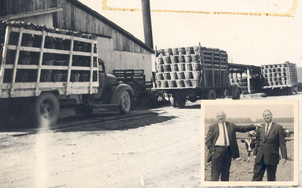 1950s black and white photo of trucks loaded with tomato hampers and inset image of Ernie Reichart