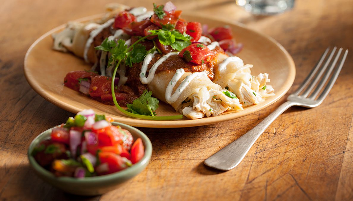 Chicken Enchiladas with Cilantro Cream and Tomato Salsa