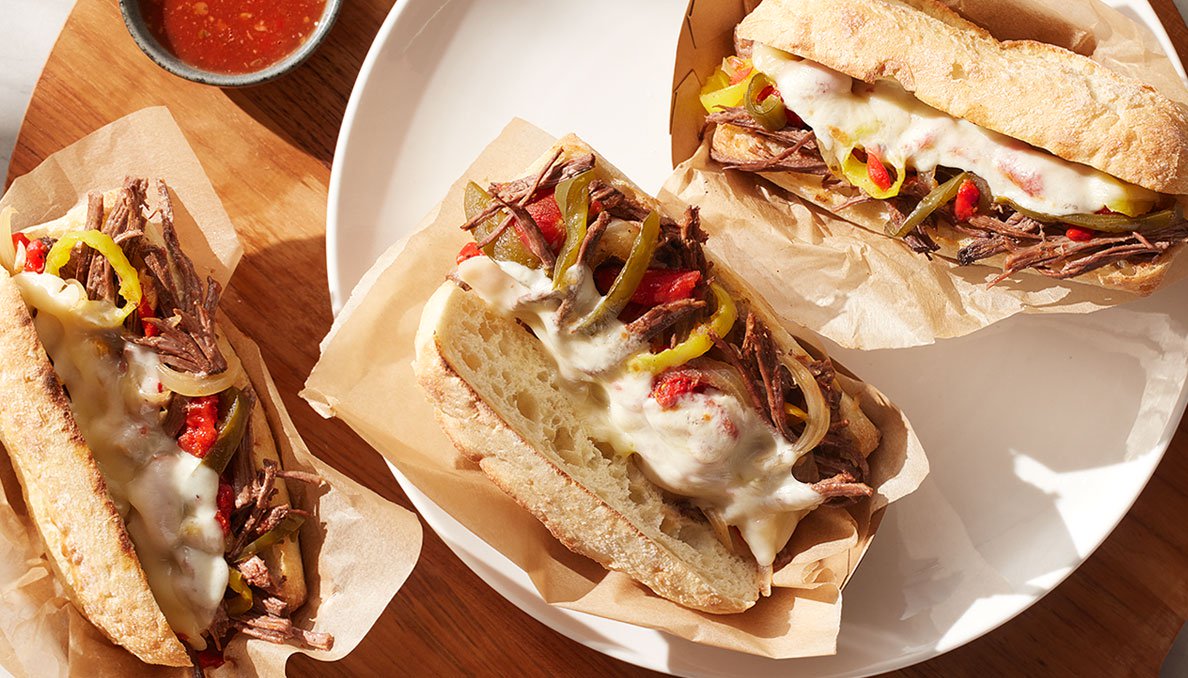 Image of Italian Beef Sandwiches with Peppers and Onions on plate