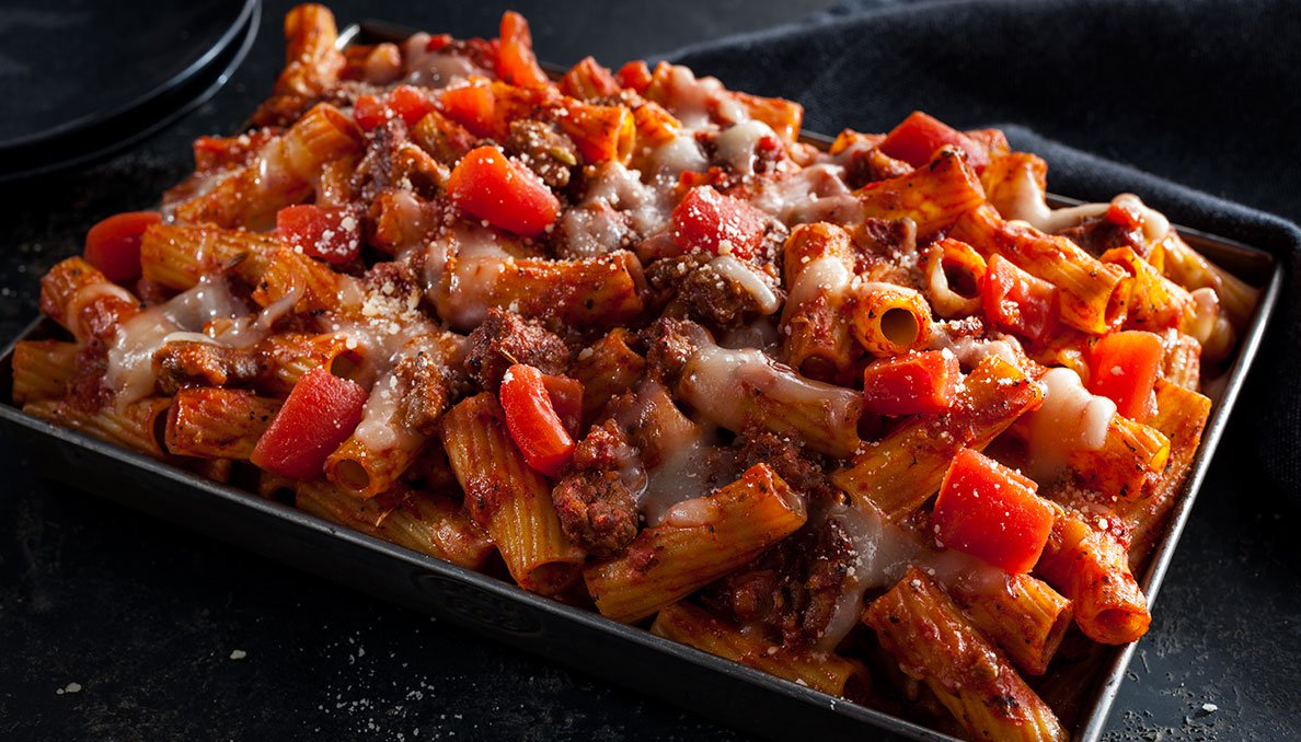 Image of Sausage Rigatoni Bake pasta dish with diced tomatoes sausage and cheese