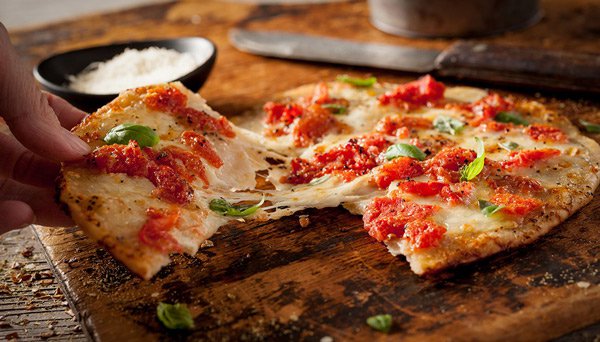Thin crust pizza cut