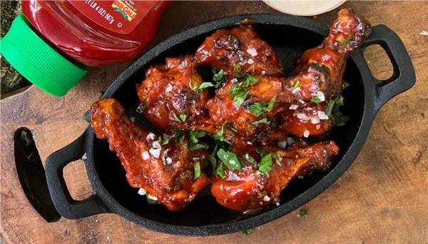 Grilled Sriracha Ketchup Hot Honey Wings with Sriracha Ketchup Ranch