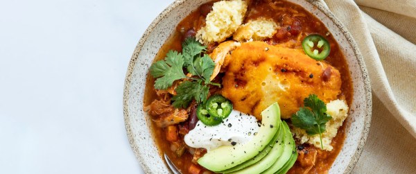 Tomato Green Chili Chicken Stew with Cornbread Dumplings