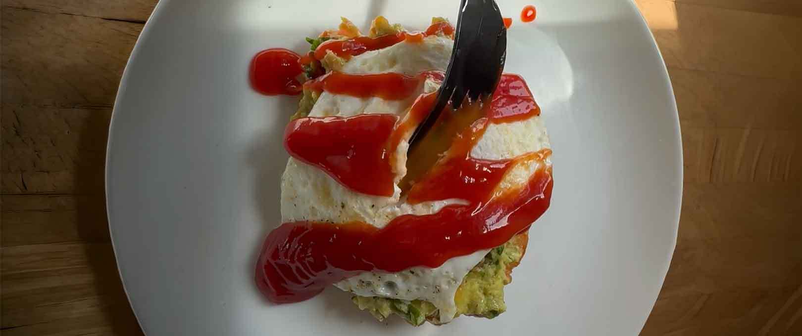 Loaded Hash Browns with Guac, Eggs and Sriracha